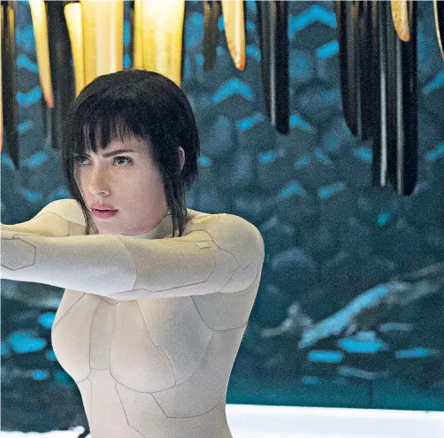  ??  ?? Scarlett Johansson, is a robot in all ways but the cerebral in Ghost in the Shell