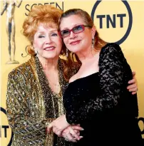  ?? Reuters file ?? Actress Debbie Reynolds poses with her daughter actress Carrie Fisher. Fisher died a day earlier. —