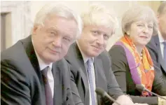  ??  ?? File photo shows May (right) with Davis (left) and Johnson in the Cabinet Room inside 10 Downing Street. — AFP photo