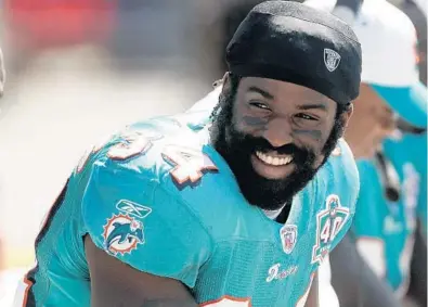  ?? AP/FILE ?? “I was dealing with physical stuff. But I also was dealing with emotional and mental stuff. Marijuana helped me work on everything I was dealing with so my internal world ran more efficientl­y,” says former Dolphin Ricky Williams, here in a 2005 photo.