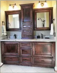  ?? SUBMITTED PHOTO ?? Shown here is a bathroom cabinet crafted by Campbell’s Custom Woodworks of West Pottsgrove for a contractor that was doing a bathroom remodel. The company, owned by Josh Campbell, has been in business a little more than one year — and specialize­s in...