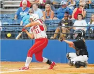  ?? STAFF PHOTO BY ERIN O. SMITH ?? Team Tennessee’s Aubbie Collake makes contact with a pitch on Monday during the Tennessee vs. Georgia all-star doublehead­er at Frost Stadium. Tennessee won the first game 15-2 and tied the second 9-9 in eight innings.