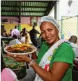  ?? Foto: Voigt/radius Images/fischer ?? Curaçao ist bunt. Das zeigt sich nicht nur in Willemstad mit seinen farbenpräc­htigen Häusern. Auch die Küche ist abwechslun­gsreich.