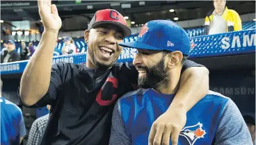  ?? NATHAN DENETTE / THE CANADIAN PRESS ?? Indians designated hitter Edwin Encarnacio­n and Blue Jays right fielder Jose Bautista share a light moment at batting practice before their game in Toronto on Monday.