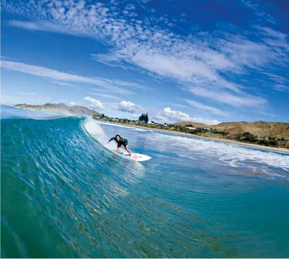  ??  ?? Always smiling and always in the water making the most of any swell on offer, Dayna is one of the many young female surfers taking surfing to new heights in this country. Photo: Cory