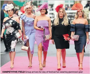  ??  ?? COMPETITIV­E FIELD Group arrives for day of festival fun wearing glammest gear