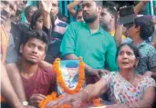  ?? — PTI ?? Relatives of slain CRPF jawan K.K. Pandey mourn during his funeral in Rohtas on Wednesday.