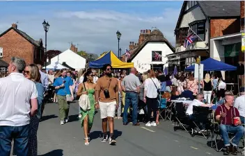  ?? Claire Brown of Stand Up For Southport ?? Crowds enjoy the event in Churchtown Village in Southport