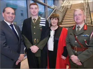  ??  ?? Minister Paul Kehoe, Major General Kieran Brennan, Dr Patricia Mulcahy, President IT Carlow, and Wexford graduate, Pte Stephen Tyrrell, at the conferral ceremony at IT Carlow.