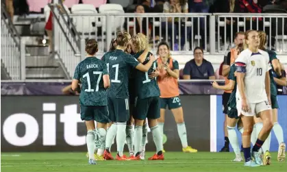  ?? ?? Germany celebrate after the USA goalkeeper Casey Murphy’s own goal during the second half of Thursday’s friendly in Fort Lauderdale, Florida. Photograph: Omar Vega/Getty Images