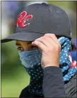  ?? DAVID CARSON — THE ASSOCIATED PRESS ?? St. Louis RiverCats’Carter Herrin wears a face during the Mother’s Day Classic baseball tournament on May 9in Cottlevill­e, Mo.