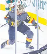  ??  ?? Max Pacioretty pumps his fist after scoring his second goal at 2:00 of overtime and completing a furious rally to give the Golden Knights a 5-4 victory over the Minnesota Wild.