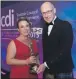  ??  ?? PRIZE: Helen Dewar of MDive receives the award from John Swinney, MSP