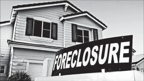  ?? JUSTIN SULLIVAN/GETTY ?? A frequent mistake made by some first-time buyers is assuming that the bank selling a foreclosed property will also finance the mortgage.