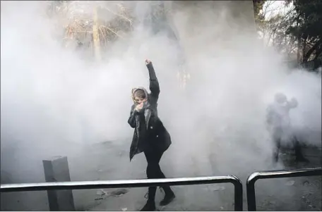  ?? AFP/Getty Images ?? IRAN banned the popular app Telegram for several days to keep recent demonstrat­ions, including one in Tehran, above, from growing.