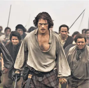  ??  ?? Sam Heughan as Jamie Fraser in the TV series it has rekindled romantic notions of the Jacobite rising