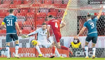  ??  ?? Andy Considine pops up to grab his first goal of the season