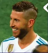  ?? ?? Sly smile: Ramos grins as Liverpool’s most potent weapon heads for the dressing room