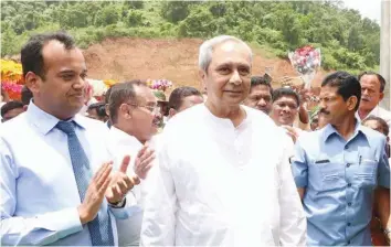  ??  ?? Odisha chief minister and BJD president Naveen Patnaik at a public event. ( Right) Congress president Niranjan Patnaik’s social media campaign to highlight alleged corruption in Gurupriya bridge.