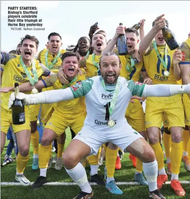  ?? PICTURE: Nathan Cracknell ?? PARTY STARTERS: Bishop’s Stortford players celebrate their title triumph at Herne Bay yesterday