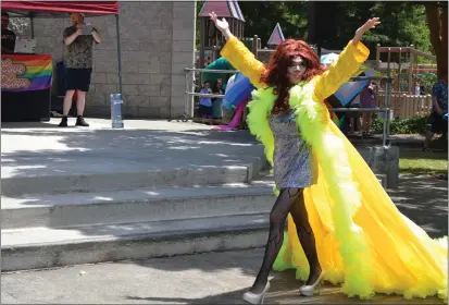  ?? PHOTOS BY NICK SESTANOVIC­H — THE REPORTER ?? Drag performer Ling Ling lip-syncs to Yvonne Elliman's “If I Can't Have You” at Vacaville's second Pride in the Park, hosted by Vacaville People's Forum and Solano Pride Center.