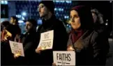  ?? ANDREW KELLY / REUTERS ?? People gather in Foley Square during a vigil for the victims of the West Side Highway pickup truck attack in New York on Wednesday.