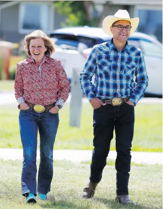  ?? LEAH HENNEL ?? Premier Rachel Notley and Finance Minister Joe Ceci are busy pressing the flesh at Stampede. Notley’s understand­ing of Calgary is improving, writes Don Braid.