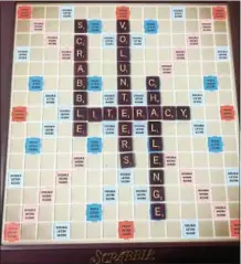  ?? FILE PHOTO ?? A Scrabble board spells out Literacy Volunteers Scrabble Challenge.