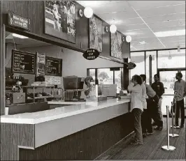  ?? TOM PURIN / THE PALM BEACH POST ?? June 1970: The interior of Broadway Joe’s restaurant in Lake Worth, which served burgers, sandwiches, subs and fries for under a buck.