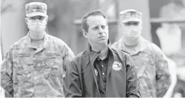  ?? DAVID SANTIAGO/MIAMI HERALD ?? Emergency Management Director Jared Moskowitz looks on during a news conference. “I understand the stakes of what we are doing,” Moskowitz said. “A day delay of getting masks out ... could be the difference in whether that doctor or nurse contracts COVID.”