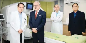  ??  ?? NEW CT SCAN –Present at the launch of DLSMC’s new 128-slice CT Scan were (from left): Dr. Efren V. De Los Santos, DLSMC board member; Raul C. Pagdangana­n, DLSMC president and CEO; Dr. Maximino G. Bello III, DLSMC assistant medical director for Quality and Risk Management; and BGen Reynaldo C. Torres, DLSMC AVP for Ancillary Services.