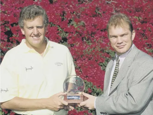  ??  ?? 0 Guy Kinnings, pictured presenting Colin Montgomeri­e with his Player of the Year Award in 1996, is excited to be joining European Tour.