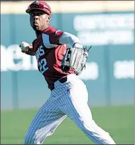  ?? NWA Democrat-Gazette/ANDY SHUPE Arkansas outfielder Curtis Washington prepares to throw home in the sixth inning during the Razorbacks’ victory over Western Illinois. It was the freshman’s first start of his college career. ??