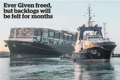  ?? Photo / AP ?? Fog horns sounded in celebratio­n as tugboats pulled the Ever Given free from the Suez Canal’s sandy bank.