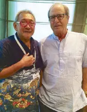  ??  ?? The author Krip Yuson with bestsellin­g author Paul Theroux at Singapore Writers Festival 2014
