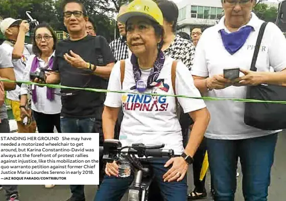  ??  ?? STANDING HER GROUND She may have needed a motorized wheelchair to get around, but Karina Constantin­o-David was always at the forefront of protest rallies against injustice, like this mobilizati­on on the quo warranto petition against former Chief Justice Maria Lourdes Sereno in early 2018.