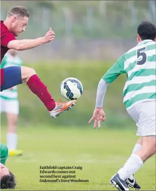  ?? PHOTO: MARC MORRIS ?? Faithfold captain Craig Edwards comes out second best against Oakwood’sDaveWoolm­an