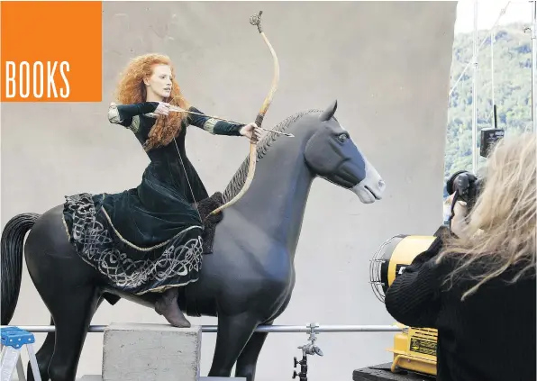  ?? SCOTT BRINEGAR/DISNEY PARKS ?? Actress Jessica Chastain strikes a pose for Annie Leibovitz during a shoot back in 2013. The acclaimed photograph­er’s latest coffee-table book, titled Annie Leibovitz: Portraits 2005-2016, features 150 stunning images of various stars.