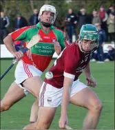  ??  ?? Kyle Firman of St. Martin’s is watched by Declan Ruth (Rapparees) in Saturday’s drawn JHC semi-final.