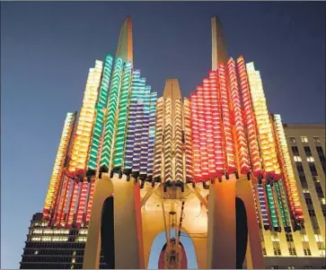  ?? Patrick T. Fallon For The Times ?? THE TRIO behind the Triforium’s brief rebirth said they wanted to showcase artist Joseph Young’s original vision — “he wanted you to hear color and see music” — that was held up by technical constraint­s 43 years ago.