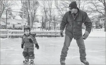  ?? KENT MACDONALD/SPECIAL TO THE NEWS ?? Jeremy Horne spends some time skating with his son Drummond, 3, at the West Side Community Centre in New Glasgow.