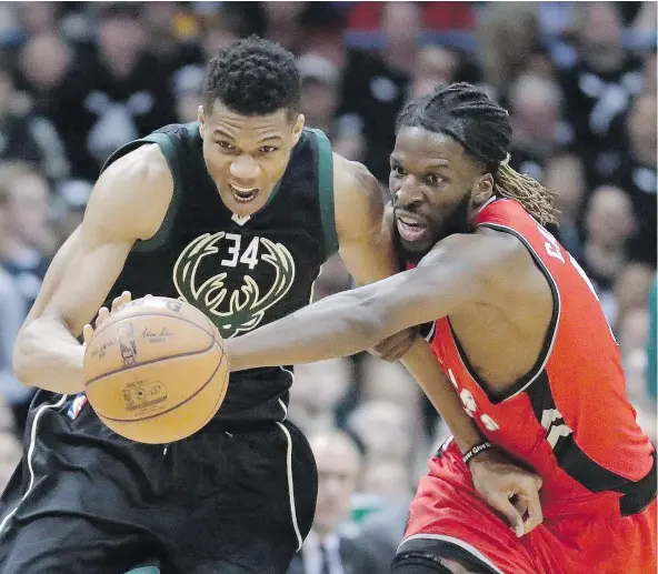  ?? — THE CANADIAN PRESS FILES ?? Former Raptors forward DeMarre Carroll, seen here playing against Milwaukee Bucks’ Giannis Antetokoun­mpo last season, has opened up about what he thought plagued the club last season. Following a trade, Carroll now plays for the Brooklyn Nets.