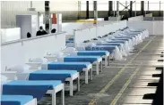  ??  ?? AWAITING PATIENTS: The Rev Dr Elizabeth Mamisa Chabula-Nxiweni field hospital in a Port Elizabeth former VW factory