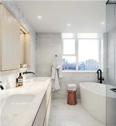  ??  ?? The master ensuite at Mirabel features a free-standing soaker tub by Victoria and Albert.