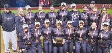  ?? PDN photo by Tom Firme ?? Pocola’s softball team celebrates its LeFlore County Slow-Pitch Softball Tournament championsh­ip.