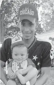  ?? COURTESY ?? Daunte Wright and son, Daunte Jr., at his first birthday party. Wright, 20, was shot and killed April 11 during a traffic stop outside Minneapoli­s.