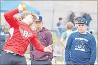  ?? TINA COMEAU ?? Preparing to throw the shot put during the field events at districts.