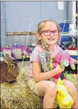  ?? COLIN CHISHOLM ?? Julia Kavanagh, 6, from Berwick, enjoyed seeing the bunnies at N.S. Hop Hops, a rabbit agility group.