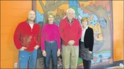  ??  ?? Tom and Elaine Carlisle donated funds to complete a piece of permanent art in the Kleptz Early Learning Center in honor of their son, Andy, who died as a child. Aullwood naturalist and artist Chris Rowlands worked with the students to create a colorful...