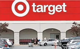  ?? CHARLES KRUPA/AP ?? Target recorded an increase of nearly 11% in sales for the quarter ending May 2.